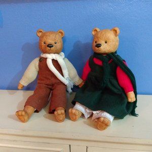 2 vintage ceramic bears in clothing